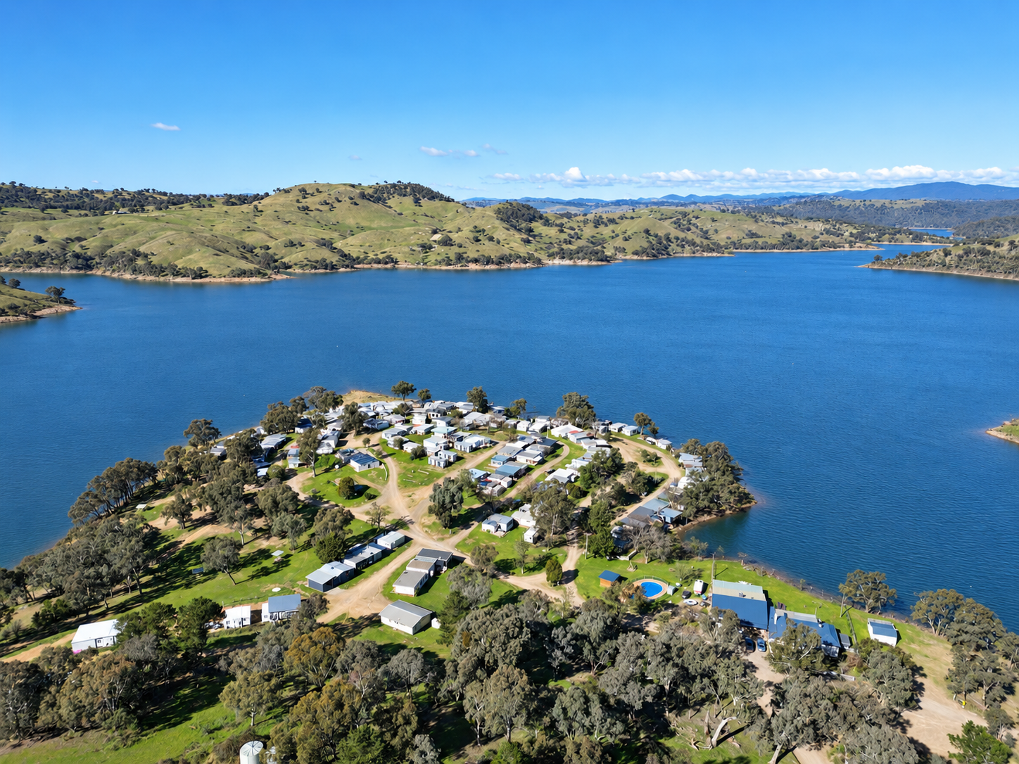 Aerial view of the lakeside resort and surrounding water